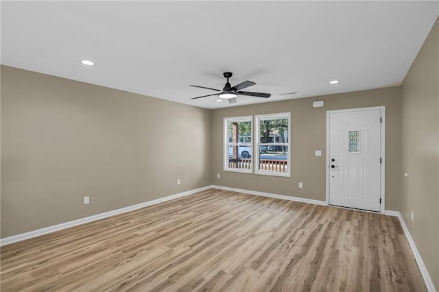 interior space featuring light wood-type flooring and ceiling fan