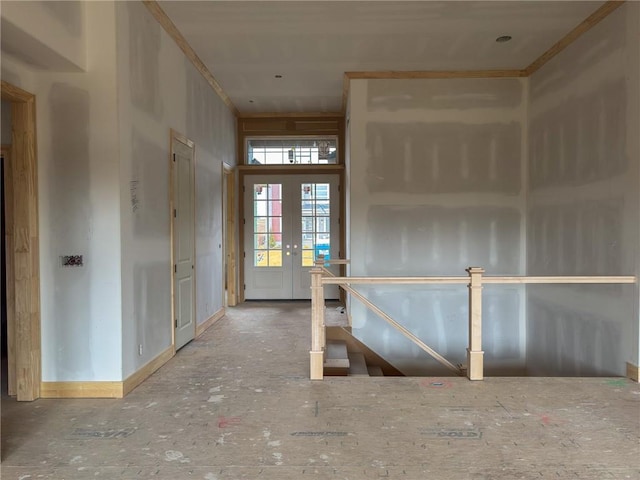 interior space featuring french doors and an upstairs landing