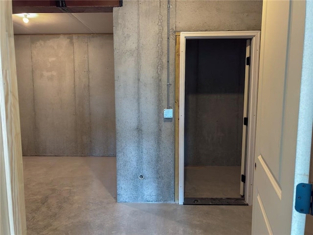 interior space featuring concrete flooring