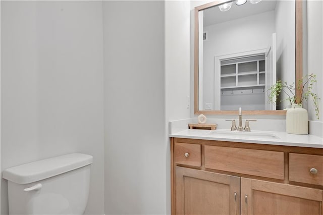 22063 W 100th Ter, Lenexa, KS 66220 - bathroom featuring vanity and toilet