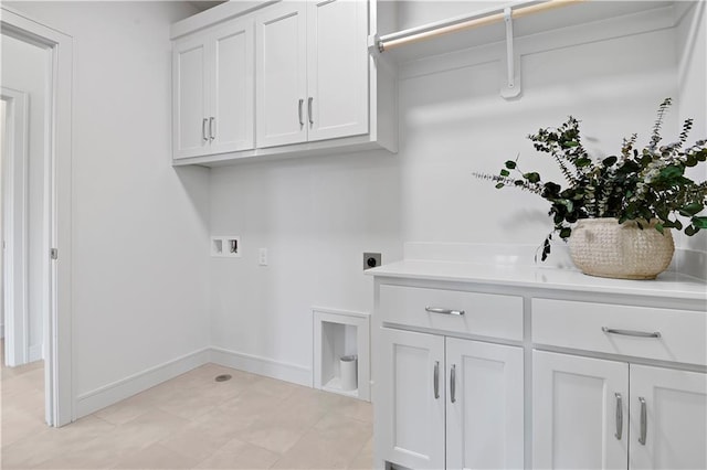 22063 W 100th Ter, Lenexa, KS 66220 - laundry room with hookup for an electric dryer, cabinet space, and hookup for a washing machine