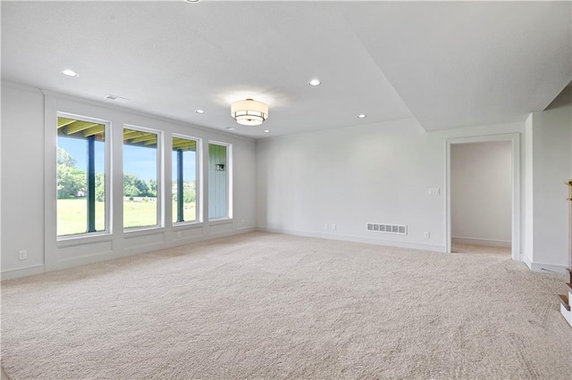 22063 W 100th Ter, Lenexa, KS 66220 - unfurnished room featuring recessed lighting and light colored carpet