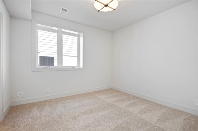 22063 W 100th Ter, Lenexa, KS 66220 - spare room with carpet and baseboards