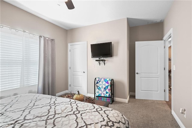 carpeted bedroom featuring ceiling fan