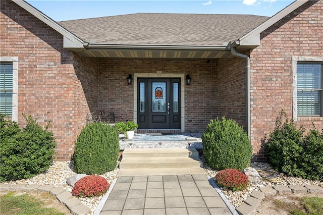 doorway to property featuring covered porch