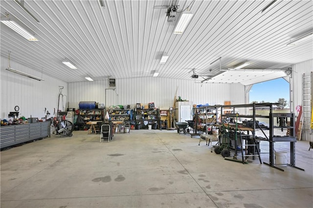 garage with a workshop area