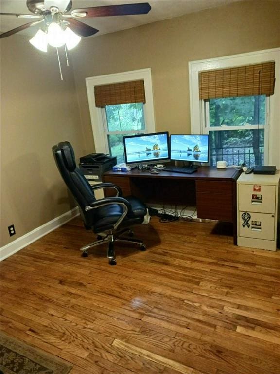 home office featuring ceiling fan and hardwood / wood-style flooring