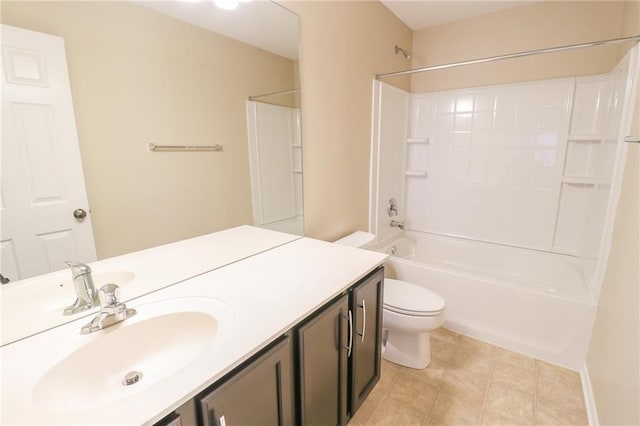 full bathroom with toilet, bathtub / shower combination, vanity, and tile patterned floors