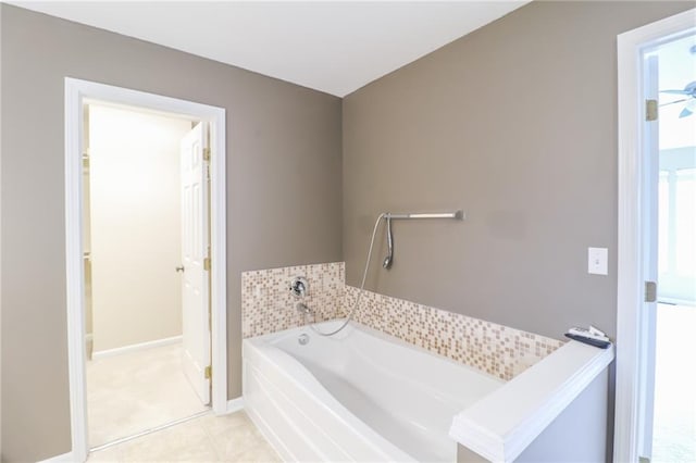 bathroom featuring a tub to relax in