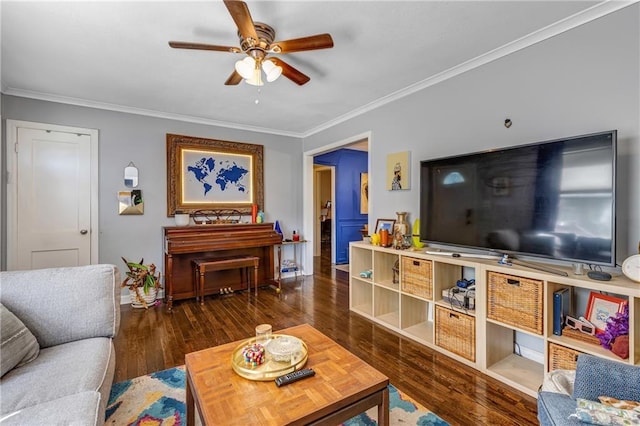 living room featuring ornamental molding, dark hardwood / wood-style flooring, and ceiling fan