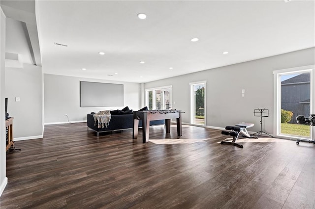 rec room with dark hardwood / wood-style floors