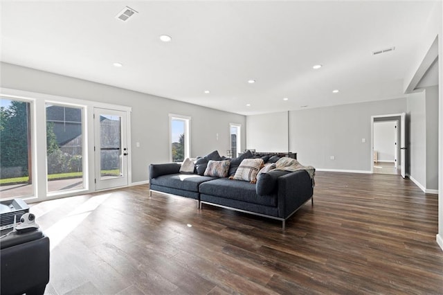 living room with dark hardwood / wood-style floors