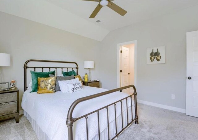 9300 Zarda Dr, Lenexa, KS 66227 - carpeted bedroom with a ceiling fan, vaulted ceiling, and baseboards