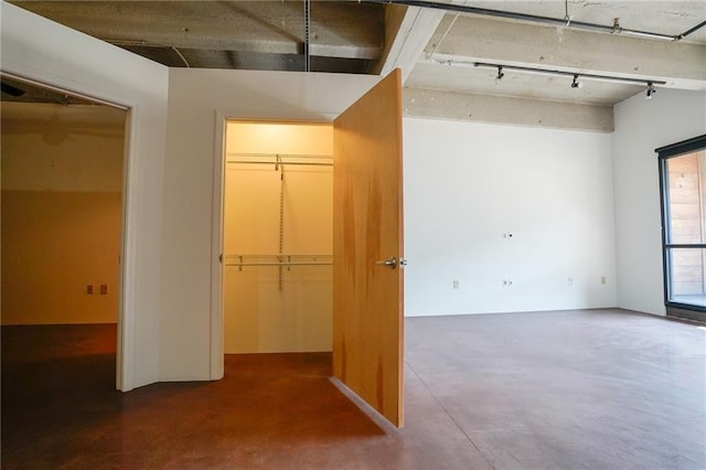 interior space featuring concrete flooring