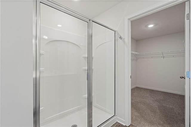 bathroom featuring walk in shower