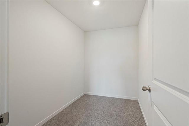 unfurnished room with carpet flooring