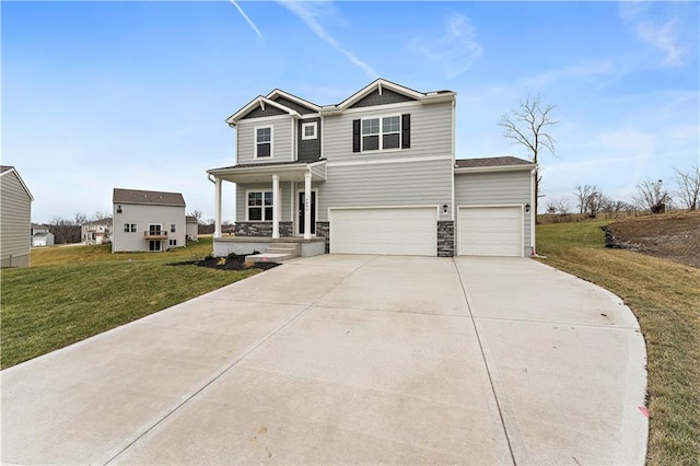 view of front of house with a front lawn, a porch, and a garage