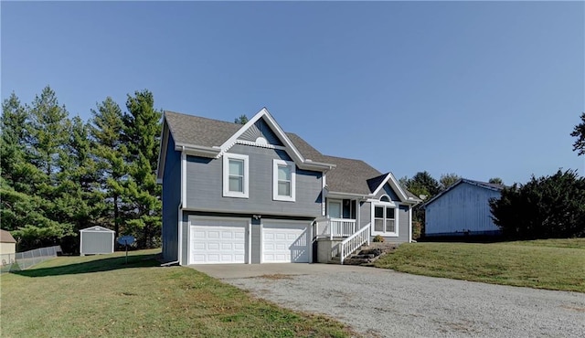 view of front of house featuring a garage and a front lawn