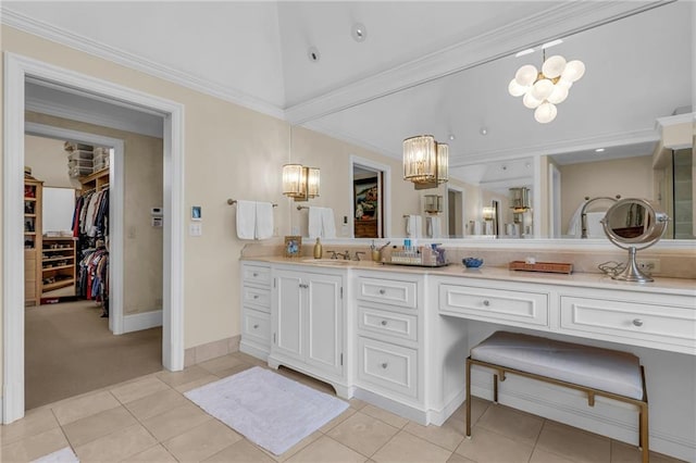 bathroom with vanity, crown molding, and tile patterned floors