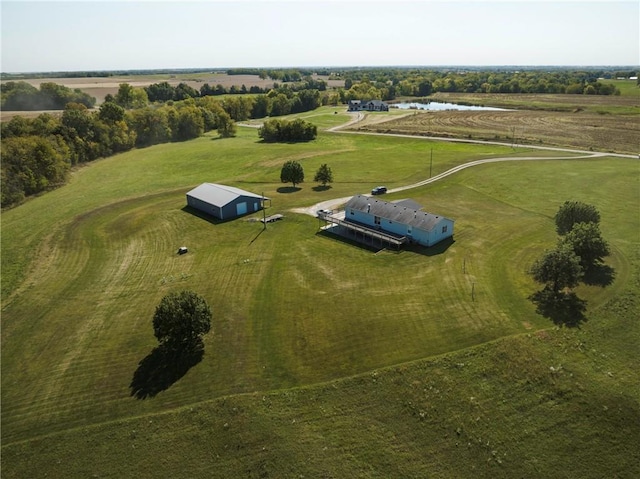 birds eye view of property with a rural view