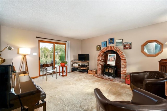 carpeted living room featuring a textured ceiling and a wood stove