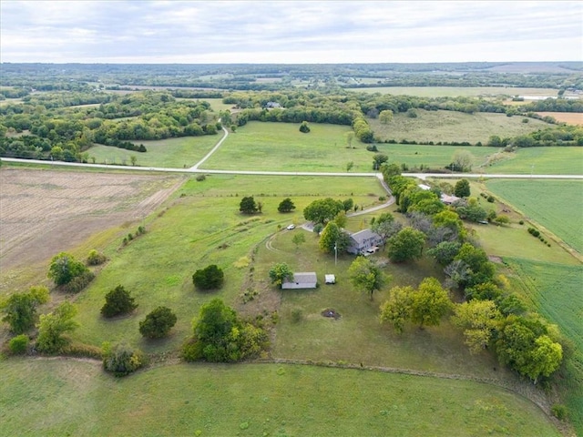 birds eye view of property featuring a rural view