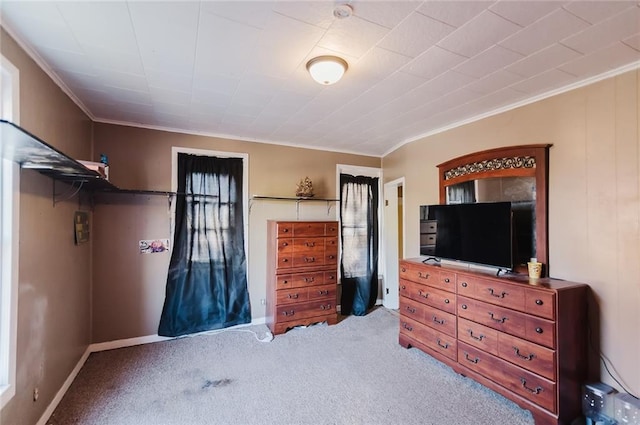 929 N 7th St, Atchison, KS 66002 - carpeted bedroom with ornamental molding and baseboards