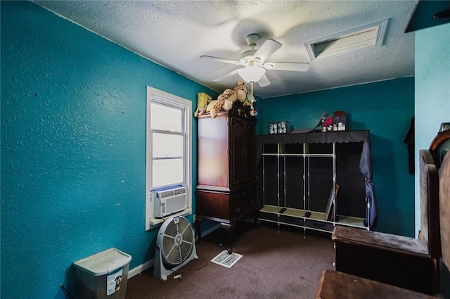 929 N 7th St, Atchison, KS 66002 - bedroom featuring a textured ceiling, cooling unit, carpet floors, a textured wall, and a ceiling fan