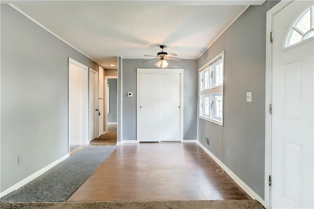 foyer entrance featuring hardwood / wood-style flooring and ceiling fan