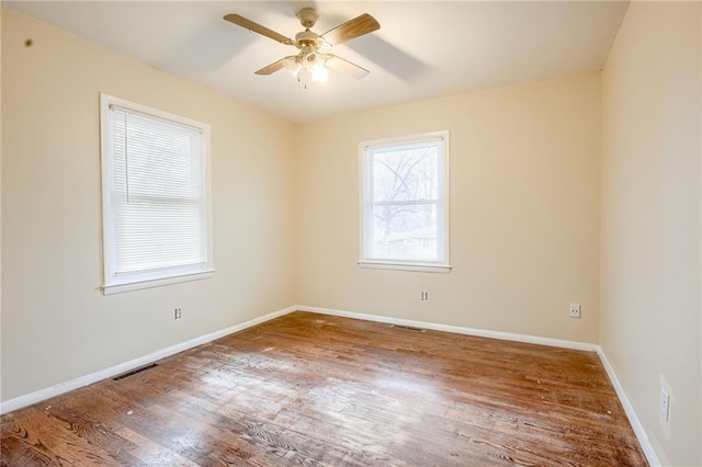 unfurnished room featuring ceiling fan and wood-type flooring