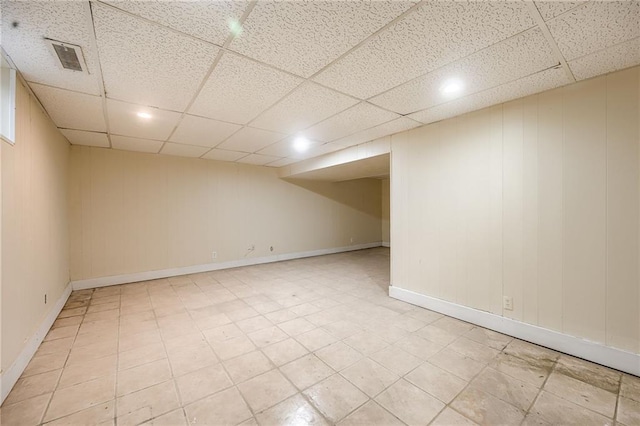 basement with a drop ceiling