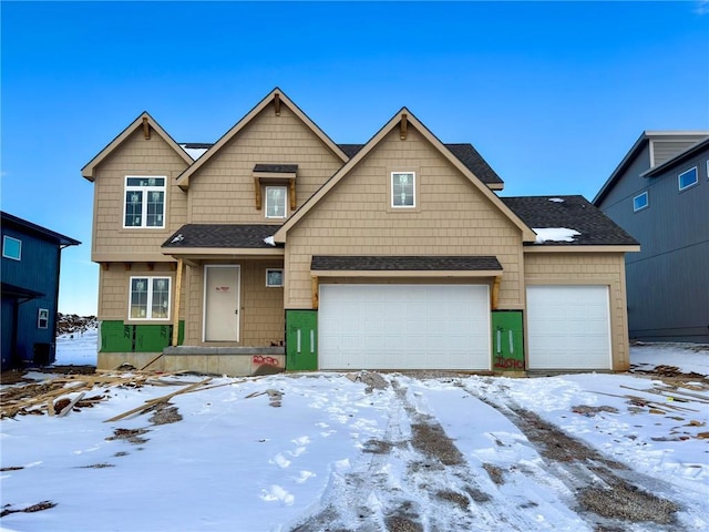 view of front of property featuring a shingled roof