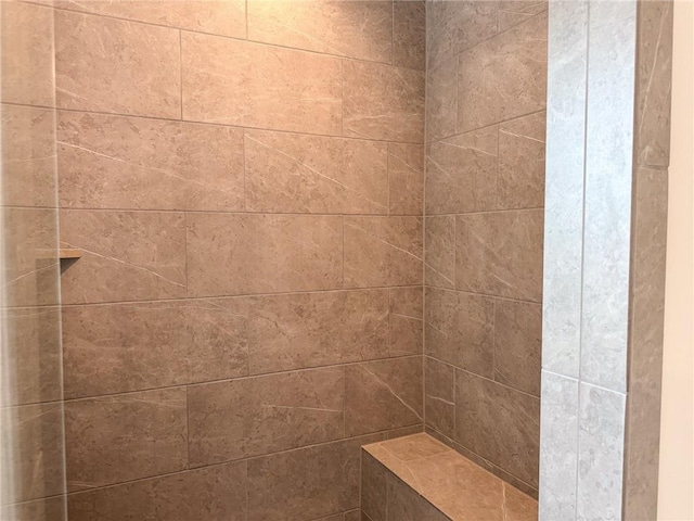 bathroom view of tiled shower