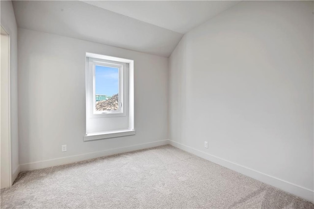 22070 W 100th Ter, Lenexa, KS 66220 - unfurnished room with light colored carpet and lofted ceiling