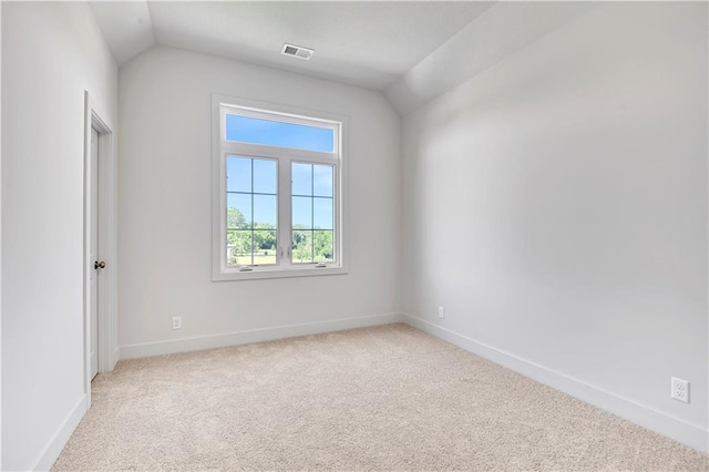 22070 W 100th Ter, Lenexa, KS 66220 - unfurnished room with light colored carpet and vaulted ceiling