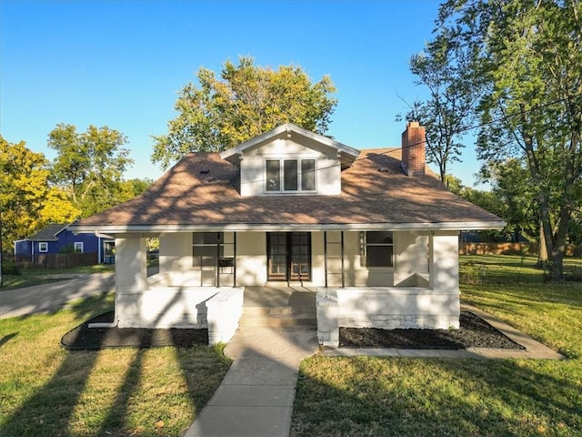 view of front of house with a front yard