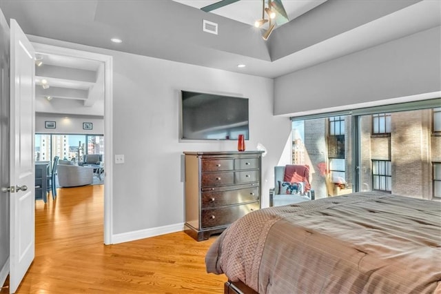 bedroom with light wood-type flooring and ceiling fan