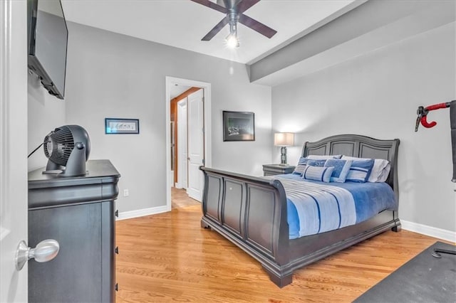 bedroom featuring light wood-type flooring and ceiling fan