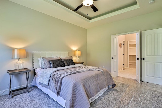 845 Willow Tree Ct, Higginsville, MO 64037 - bedroom with a raised ceiling, baseboards, ceiling fan, and crown molding