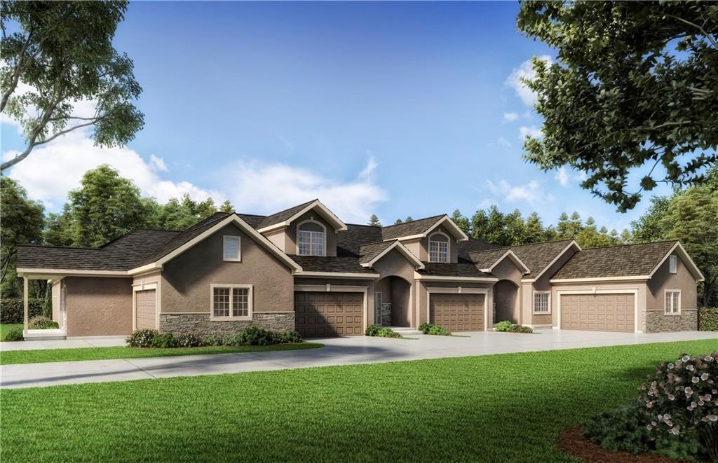 17386 S Raintree Dr Bldg I Unit 35, Olathe, KS 66062 - view of front facade featuring stucco siding, stone siding, and a front yard