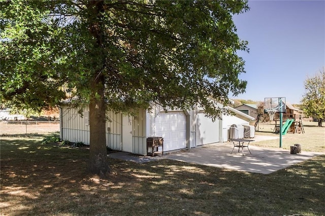 exterior space with a lawn and a playground