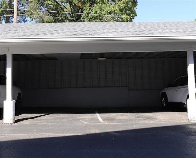 exterior space with a carport