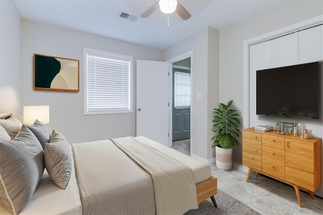 bedroom featuring ceiling fan