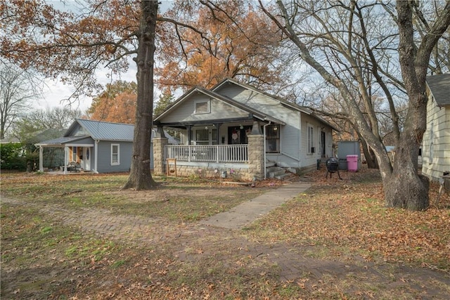 bungalow-style home featuring a porch