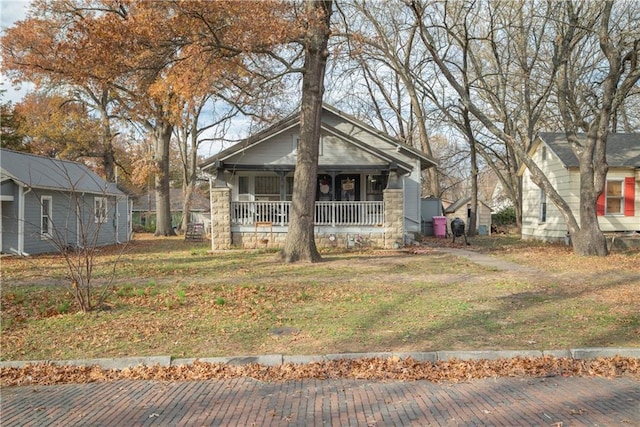 bungalow featuring covered porch