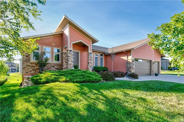 4500 SW Aft Dr, Lees Summit, MO 64082 - view of front of property featuring stone siding, concrete driveway, a front yard, and a garage
