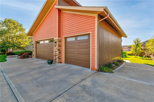 garage featuring wooden walls