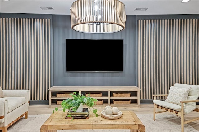 interior space with a chandelier and wood-type flooring