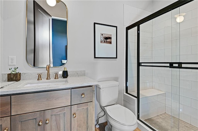 17004 Parkhill St, Overland Park, KS 66221 - bathroom featuring toilet, vanity, and a shower stall