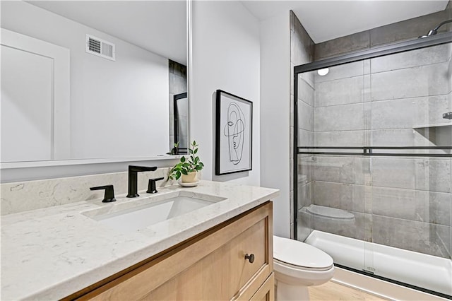 17004 Parkhill St, Overland Park, KS 66221 - full bathroom with toilet, vanity, and a shower stall